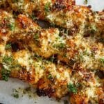 Grilled Ranch Garlic Parmesan Chicken Skewers with golden crust and fresh parsley garnish