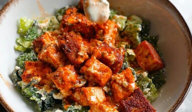 Crispy Buffalo Tofu with Caesar Salad in a bowl