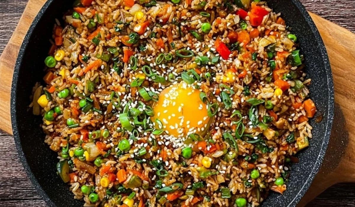 Featured Korean Veggie Fried Rice with egg and vegetables in skillet