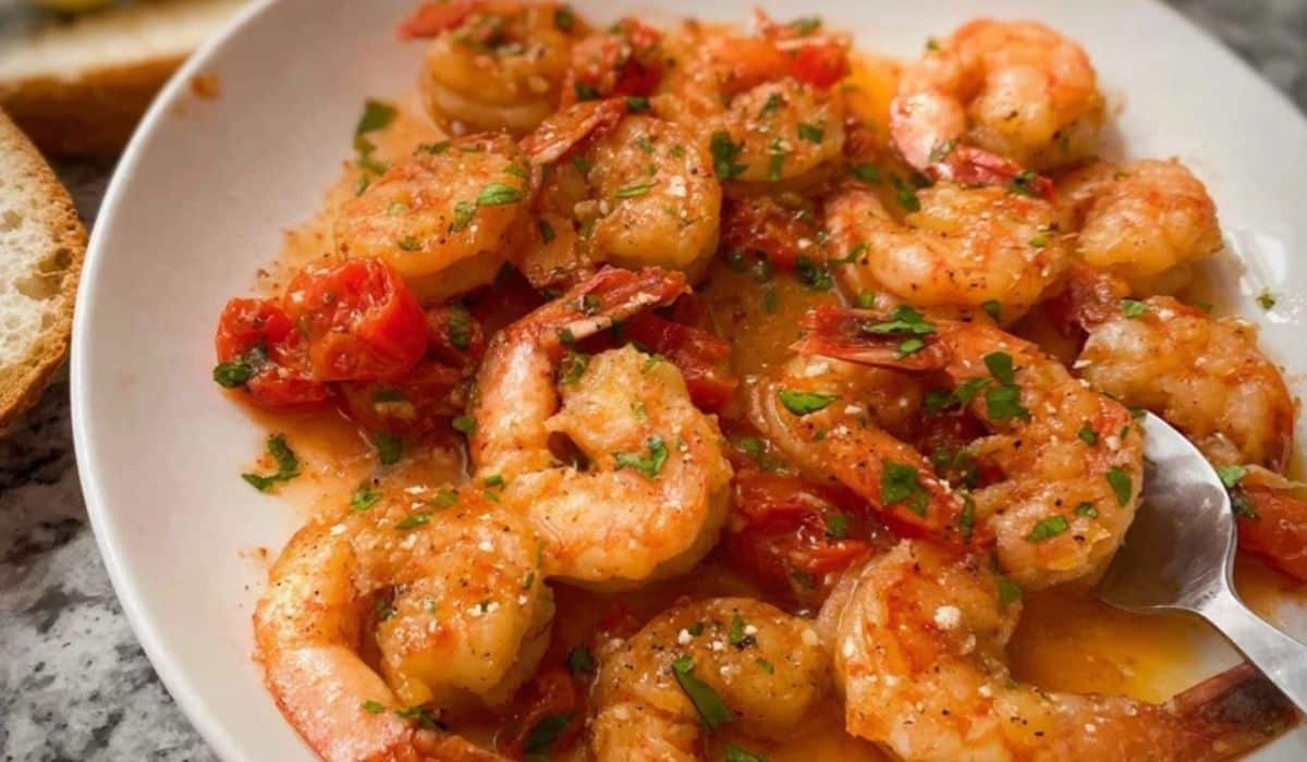 Tomato Shrimp Scampi served with blistered tomatoes and parsley
