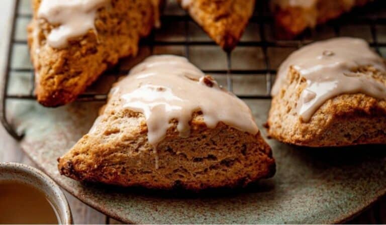 Maple Chai Glazed Scones served on rustic ceramic plate