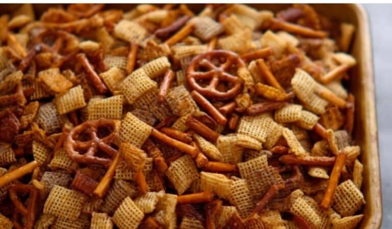 Homemade Chex Mix in a festive holiday bowl