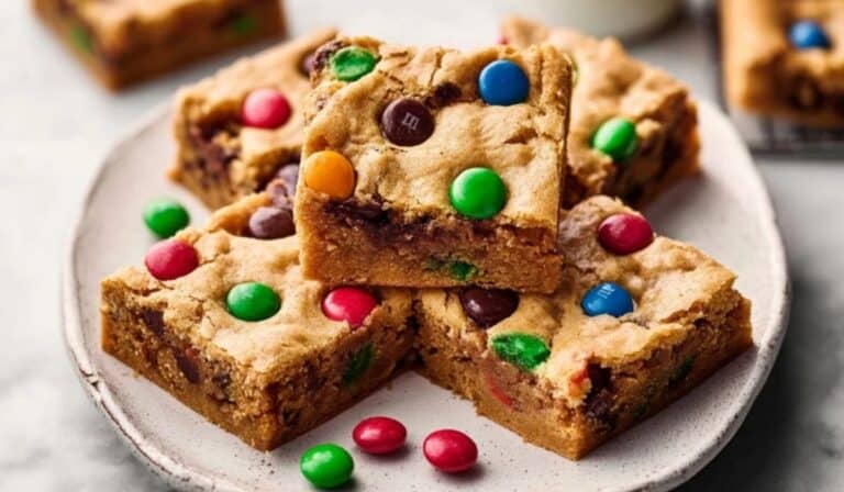 Soft-Baked M and M Cookie Bars served on a white plate
