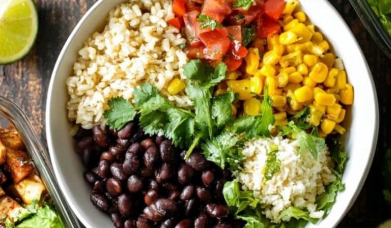 Black bean burrito bowl batch cook spread with bowls and meal prep containers
