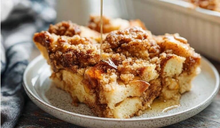 Overnight French toast bake in a baking dish with cinnamon topping